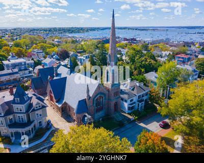 Channing Memorial Church aerial view at Touro Park with Newport Harbor at the background in Narragansett Bay, city of Newport, Rhode Island RI, USA. Stock Photo