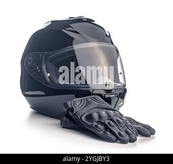 Black motorcycle helmet and leather gloves isolated on a white background. Stock Photo