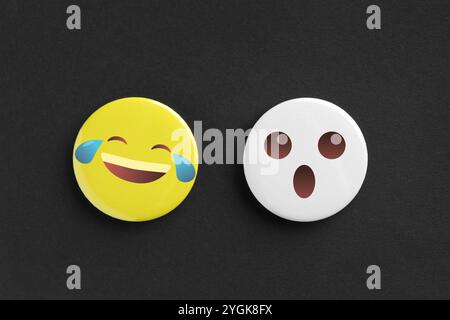 Badges displaying different emotions on black background Stock Photo