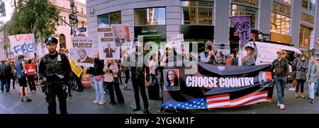 Choose Country Banner with Kamala Harris and Tim Walz held by Anti-Trump Protesters outside Madison Square Garden in NYC USA 27 Oct 2024 Stock Photo