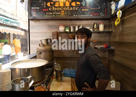 Indian man standing in tea stall Stock Photo