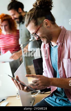 Success business man with tablet, analytics and developer for startup business website IT software Stock Photo