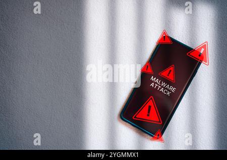 System hacked warning alert on laptop. Virus, Spyware, Malware or Malicious software. Woman receives warning notification on laptop. Stock Photo