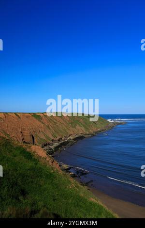 View over the Filey Brigg peninsular, Filey town, North Yorkshire, England, UK Stock Photo