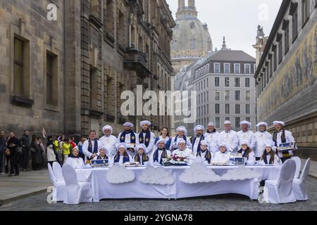 To mark the official start of the stollen season, the Dresden stollen girl Lorna Prenzel and the Dresden stollen bakers brought a large table to the F Stock Photo