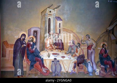 Painting of Jesus Christ at the Wedding Feast in Cana where he performed the miracle turning  water into Wine in Panagia Faneromeni Greek Orthodox Chu Stock Photo