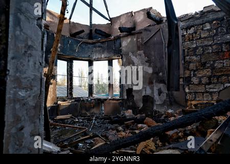 ODESA, UKRAINE - NOVEMBER 8, 2024 - A burnt-out house is seen after an overnight Russian drone attack in Odesa, southern Ukraine. One person was killed and nine others were wounded as a result of an overnight Russian drone strike on the Odesa district. Stock Photo