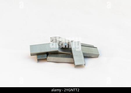 Metal staples for stapler isolated on white background Stock Photo