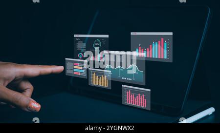 Hand man show tablet to analyze business and manage corporate data, Business analytics with charts, metrics and KPIs to improve organizational perform Stock Photo