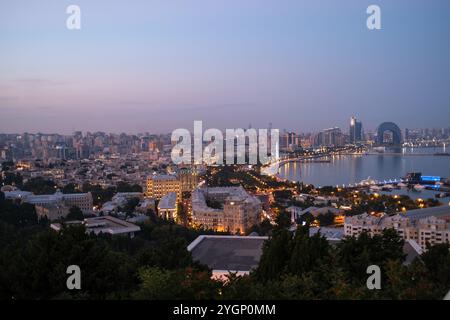 Baku, Azerbaijan. View looking towards Crescent City, with the Denis Mall in the foreground, at Dawn.  Baku is located on the western shore of the Caspian Sea Stock Photo