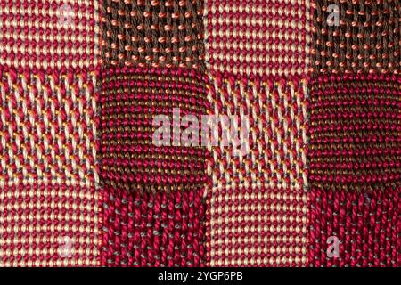 double weave cloth in red, cream, brown colors, decorative background in christmas colors Stock Photo