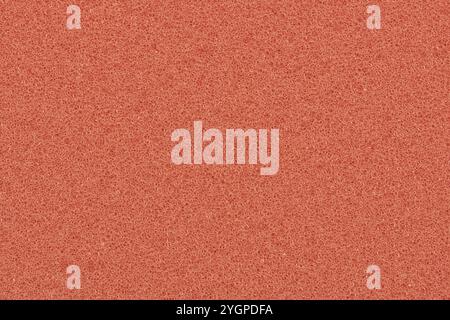 Watermelon pink foam background one color porous sponge packing material. Stock Photo