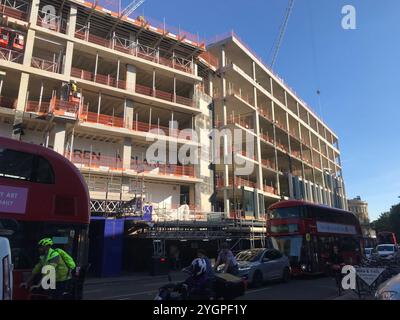 construction work being completed to multi-story buildings on Islington high street. Stock Photo