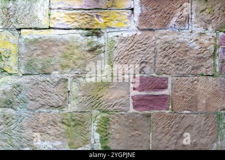 Colorful Natural Stone Wall Background Texture for Rustic and Architectural Designs Stock Photo