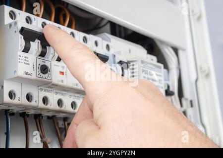 Hand Operating Electrical Circuit Breaker Switch Stock Photo