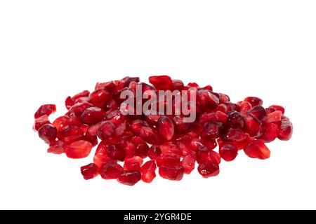 Red pomegranate seeds isolated on white background Stock Photo