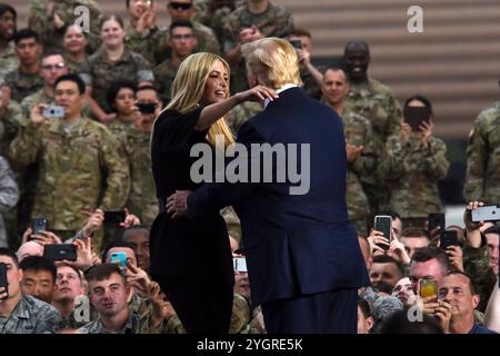 Pyeongtaek, South Korea. 30 June, 2019. U.S President Donald J. Trump, right, embraces his daughter Ivanka Trump, right, during a visit with service members at Osan Air Base, June 30, 2019, Pyeongtaek, Gyeonggi Province, South Korea.  Credit: SSgt. Sergio Gamboa/US Army Photo/Alamy Live News Stock Photo