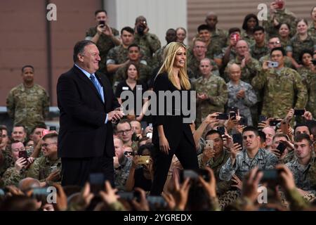 Pyeongtaek, South Korea. 30 June, 2019. U.S Secretary of State Mike Pompeo, left, and first daughter Ivanka Trump arrive to join President Donald J. Trump during a visit with service members at Osan Air Base, June 30, 2019, Pyeongtaek, Gyeonggi Province, South Korea.  Credit: SSgt. Sergio Gamboa/US Army Photo/Alamy Live News Stock Photo