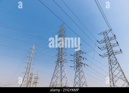 High voltage ceramic insulators on towers in Power Substation. Stock Photo