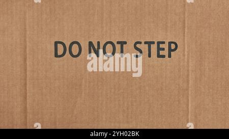 Warning labels on cardboard box silhouette shapes umbrella glass arrows ...