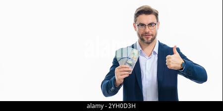 Man showing cash money in dollar banknotes. Portrait of business man isolated on white studio banner. Successful winner celebrating success or victory Stock Photo