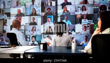 Online Video Conference Call In Boardroom Meeting Stock Photo