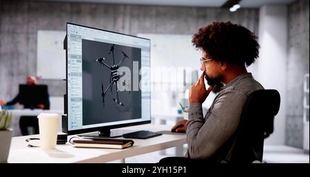 Engineer Doing 3D CAD Model Design On Computer At Office Stock Photo