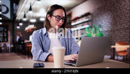 Work And Study On Laptop Computer. Student Typing Stock Photo
