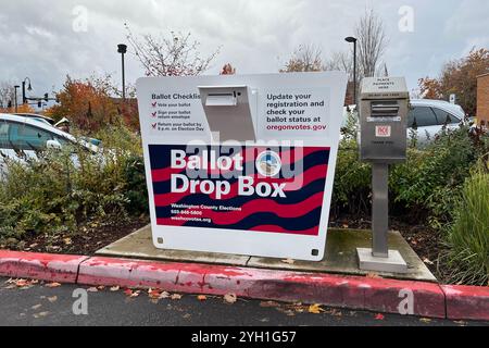 A ballot drop box is seen in the parking lot outside of the Tualatin Public Library in Oregon. Stock Photo