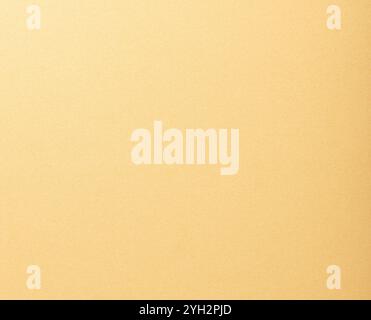 Minimalist designer paper texture. Elegant, smooth background in warm beige and yellow tones, showcasing a chic, monochrome surface. Soft, neutral, an Stock Photo