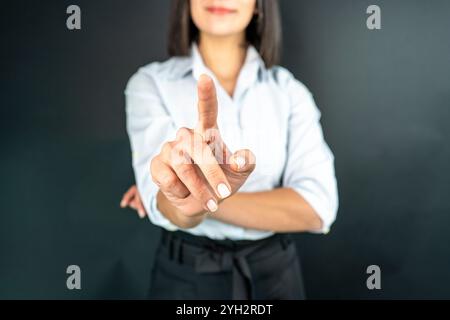 Businesswoman touching in empty screen. Stock Photo