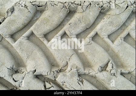 Tractor tyre track in the sand Stock Photo