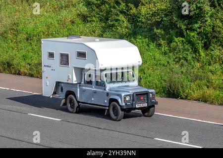 Artica 240 LR Silver Land Rover cab-over two-berth demountable camper van. Overland Defender 130 H-C D/C P-U Tdc LCV Heavy Duty Pick Up Diesel 2402 cc Stock Photo