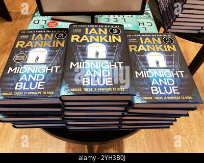 Copies of the Ian Rankin bestseller Midnight and Blue from 2024, Inspector Rebus novel at the bookstore. The 25th novel in the Inspector Rebus series. Stock Photo