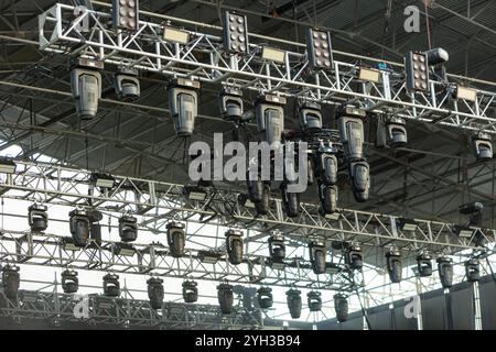 Design of spotlights hanging on the ceiling of the stage at a music festival Stock Photo