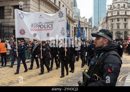 Poultry, City of London, UK. 9th Nov, 2024.The historic Lord Mayor’s Show is over 800 years old and in modern times consists of thousands of participants travelling from Guildhall to the City of Westminster. Volunteer Police Cadets group with armed police officer on duty Stock Photo