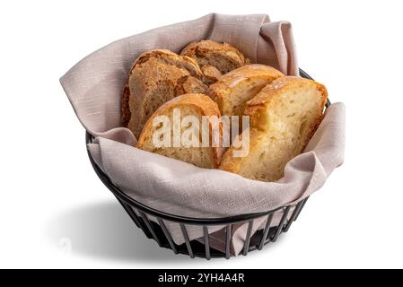 Slices of wheat flour bread and slices of wholemeal bread on napkin in basket isolated on white with clipping path included Stock Photo