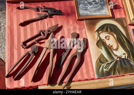 Trevi, Italy - 11 03 2024 - Garden tools from the 1950s sold at a flea market in Umbria Stock Photo