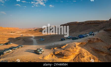 Tourist on Edge of the World, a natural landmark and popular tourist destination near Riyadh -Saudi Arabia.18-December-2019. Stock Photo