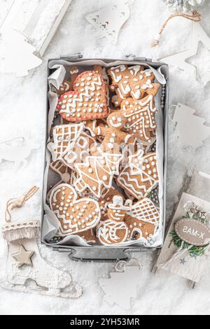 Top down view of cookies for Christmas as a small snack on snowy table Stock Photo