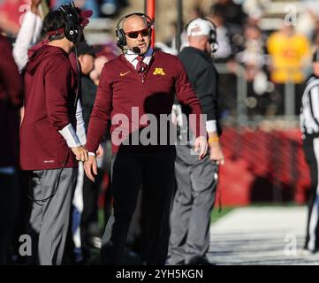 Minnesota head coach P.J. Fleck, center, receives the mayo dump after ...