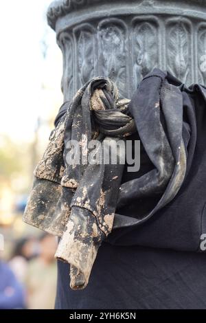 black jacket stained with mud. symbol of the volunteers at a demonstration for the flood victims. Stock Photo