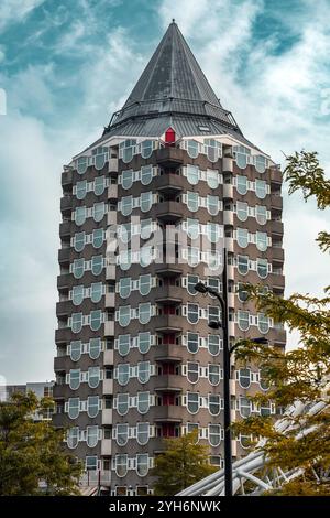 Rotterdam, NL - OCT 10, 2021: The Blaaktoren is a residential tower on the Binnenrotte near the Blaak in Rotterdam. The building is nicknamed The Penc Stock Photo