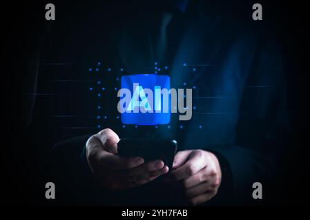 Businessman using smartphone with floating AI icon, representing artificial intelligence integration into mobile technology and business applications. Stock Photo