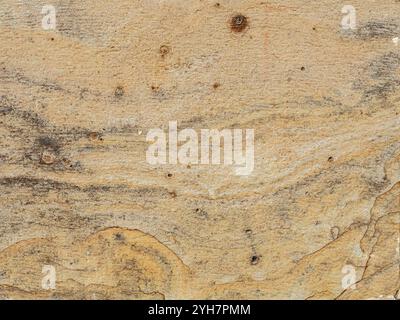 Texture of sandstone brick background. Yellow sand rock wall building. Old rock pattern for castle or antique church wall. Stock Photo