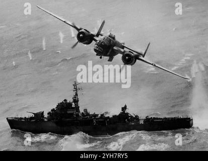 'Ruthless Ruth', a North American B-25 Mitchell medium bomber strafing a Japanese warship in 1945. Introduced in 1941 the Mitchell was used by many Allied air forces to serve in every theater of World War Two.The aircraft took part in the North Africa campaign, the invasion of Sicily and Italy. The RAF received nearly 900 Mitchells in 1943, initially to bomb targets in occupied Europe, but after the Normandy invasion, the RAF and France used Mitchells in support of the Allies in Europe. Most B-25s however were in American service and used in the war against Japan in Asia and the Pacific. Stock Photo