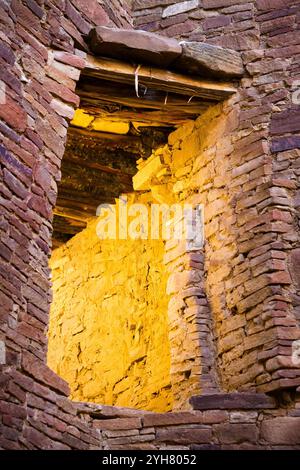 Light on the walls at Pueblo Bonito create an abstract photo in Chaco Culture National Historic Park, New Mexico. Stock Photo