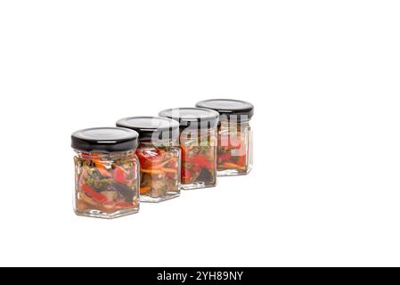 jars with different kinds of homemade spices on a white background, isolate Stock Photo