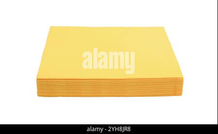 A stack of several paper table napkins isolated on white. Stock Photo