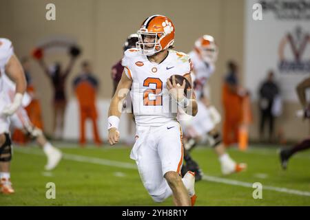 Blacksburg, VA, USA. 9th Nov, 2024. Clemson Tigers quarterback Cade Klubnik (2) scrambles with the ball during the NCAA football game between the Clemson Tigers and the Virginia Tech Hokies at Lane Stadium in Blacksburg, VA. Jonathan Huff/CSM/Alamy Live News Stock Photo